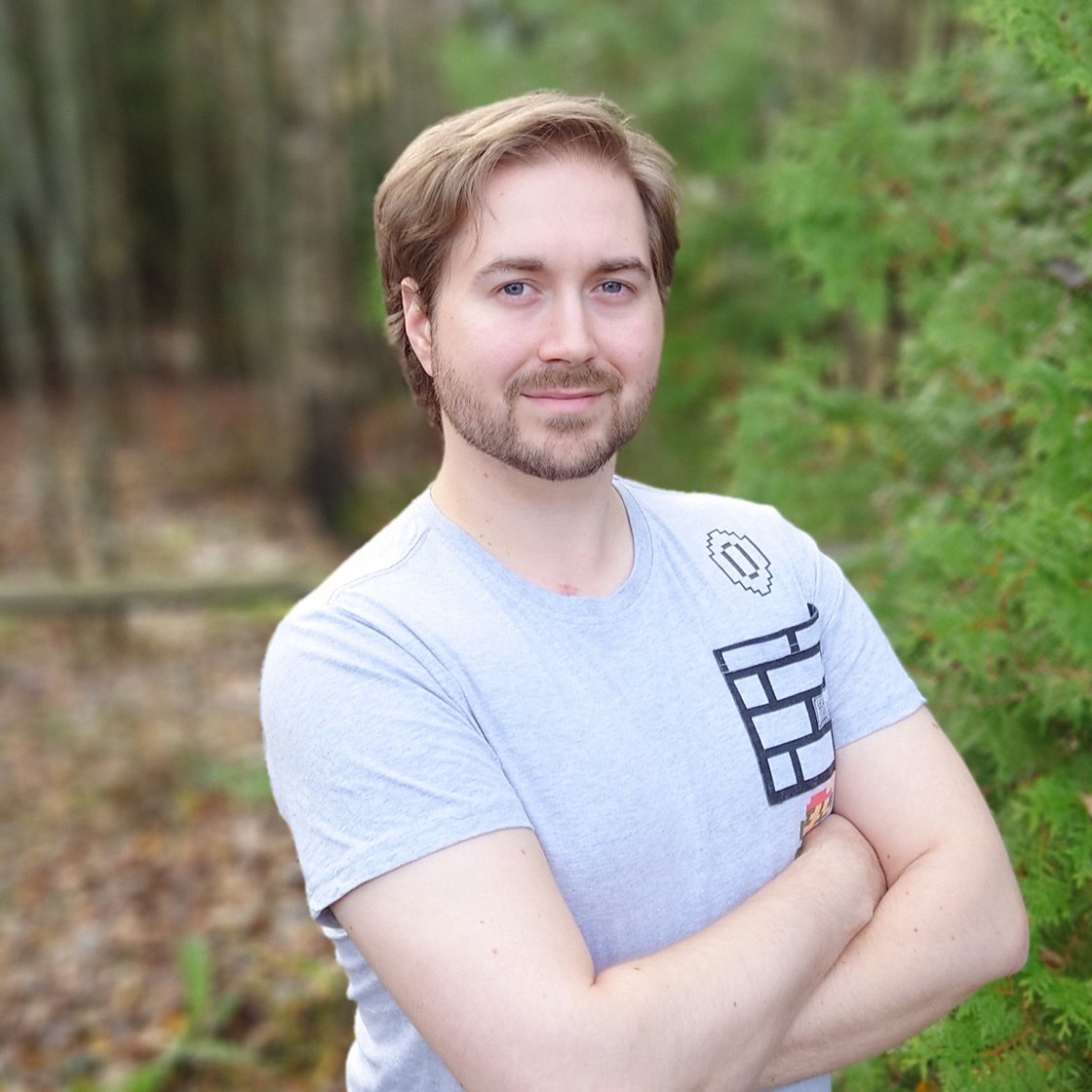 Portrait of Lauri Lavanti, with forest visible in the background.
