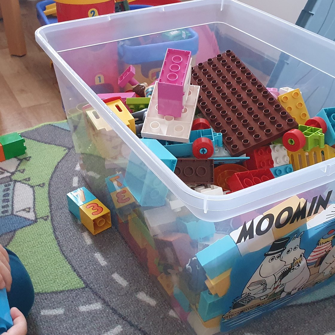 Duplo bricks in a box on top of an automaton.